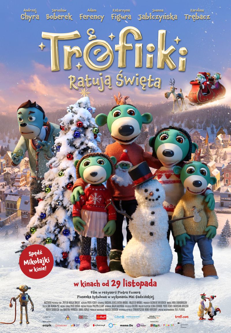 plakat. na tle ośnieżonego krajobrazu przy choince i bałwanie stoi rodzina 4 zielonych misiów, obejmując się i uśmiechając.