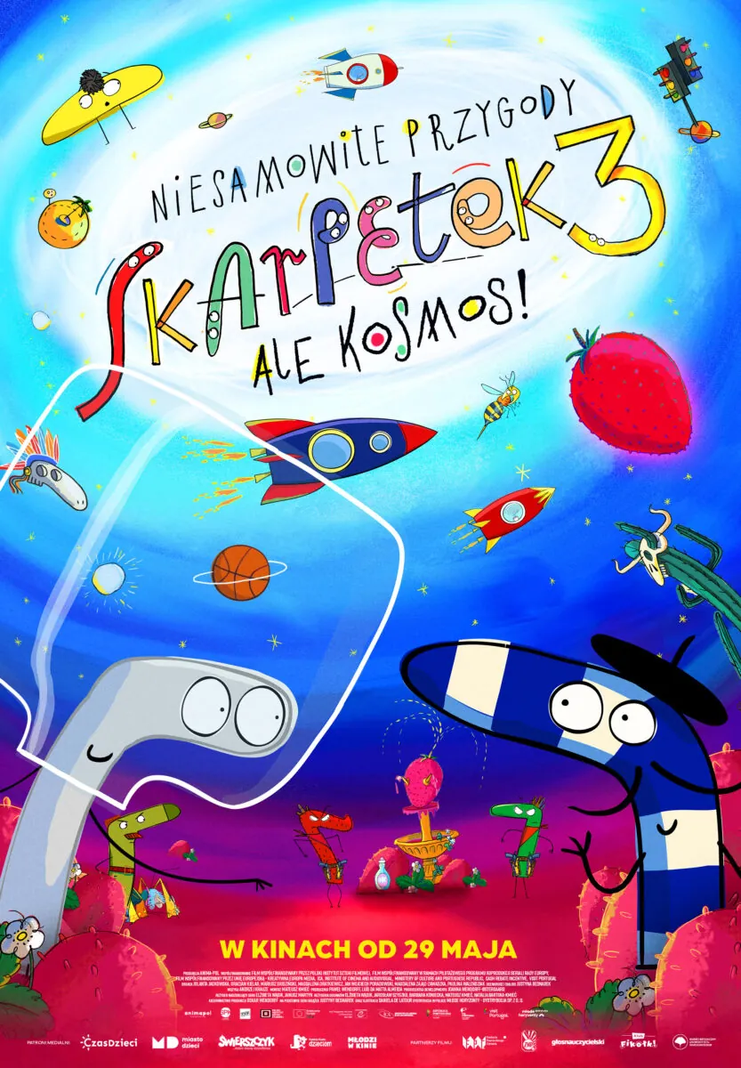 plakat. na pierwszym planie dwie kolorowe skarpetki z oczami i ustami, rozmawiają. w tle kosmos, inne żywe skarpetki, różne unoszące się obiekty, np. rakieta, truskawka.